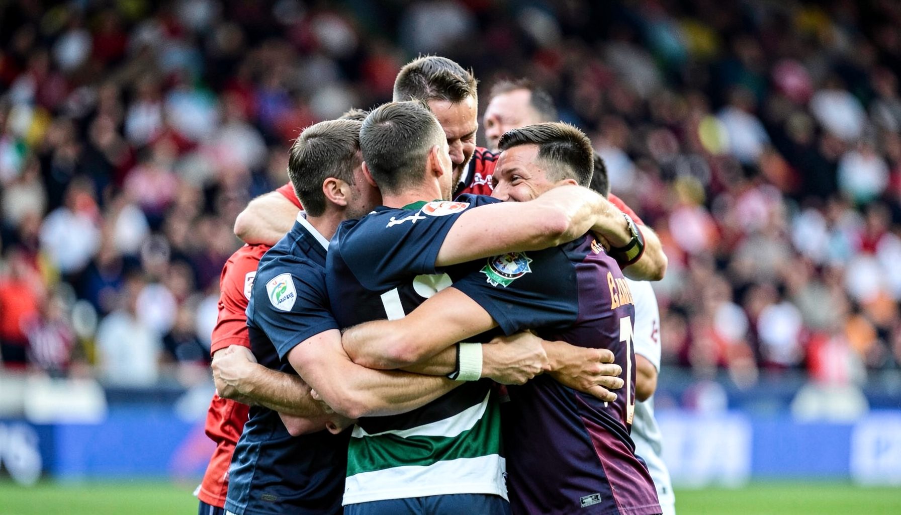 Celebration after a goal, teammates embracing, stadium crowd blurred in background